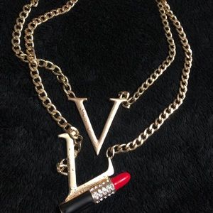 L V with lipstick necklace